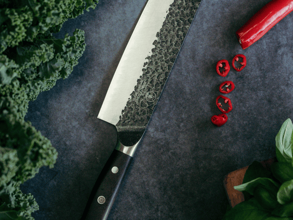 Hand-forged nakiri knife with a straight vegetable blade, sharpened on a whetstone