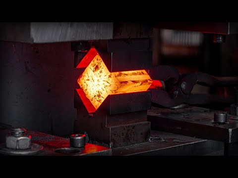 Hand-forged Damascus steel blade showing its layered pattern after etching