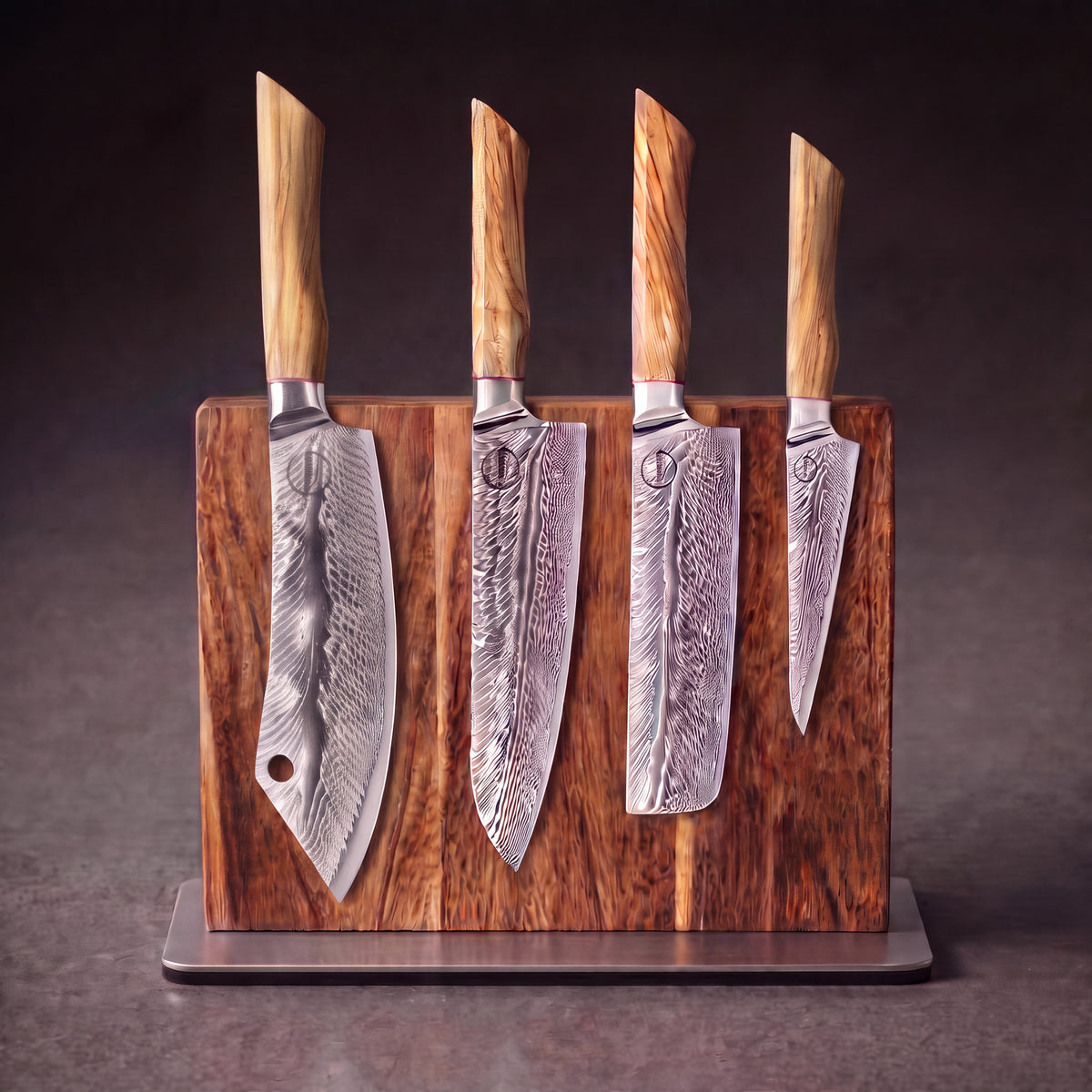 Feather Forge Emperor's Throne Set: 8 inch cleaver, 8 inch chef, 7 inch nakiri and 6 inch utility knives on the acacia magnetic display block