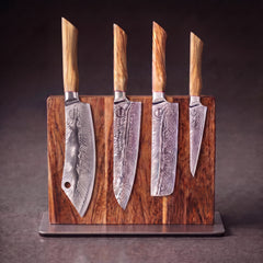 Feather Forge Emperor's Throne Set: 8 inch cleaver, 8 inch chef, 7 inch nakiri and 6 inch utility knives on the acacia magnetic display block
