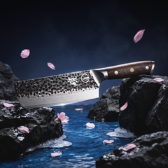 Damascus Dynasty 7 inch nakiri knife on volcanic rock