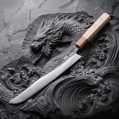 Close-up of the sword-style sakimaru tip on the Torii 10-inch slicer, hand-forged 7Cr17MoV steel