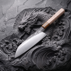 Close-up of the rounded sheep's-foot nose on the Torii 7-inch santoku knife